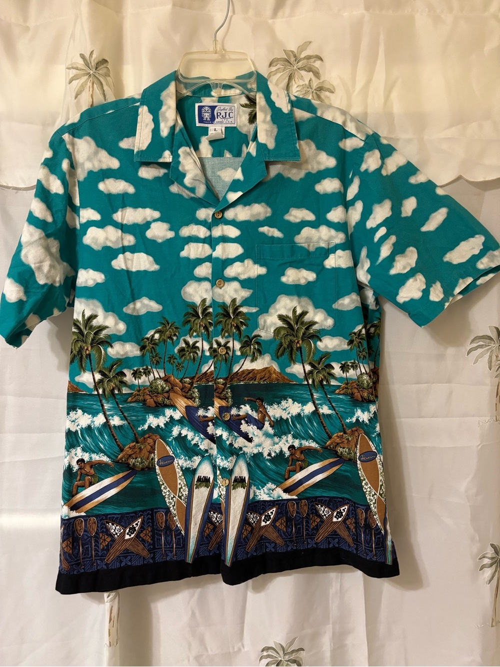 RJC  vintage ,  authentic made in Hawaii button shirt .